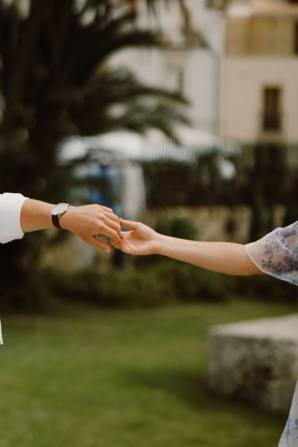 Close-up of couple's hands during an engagement photoshoot in Syracuse, Sicily.