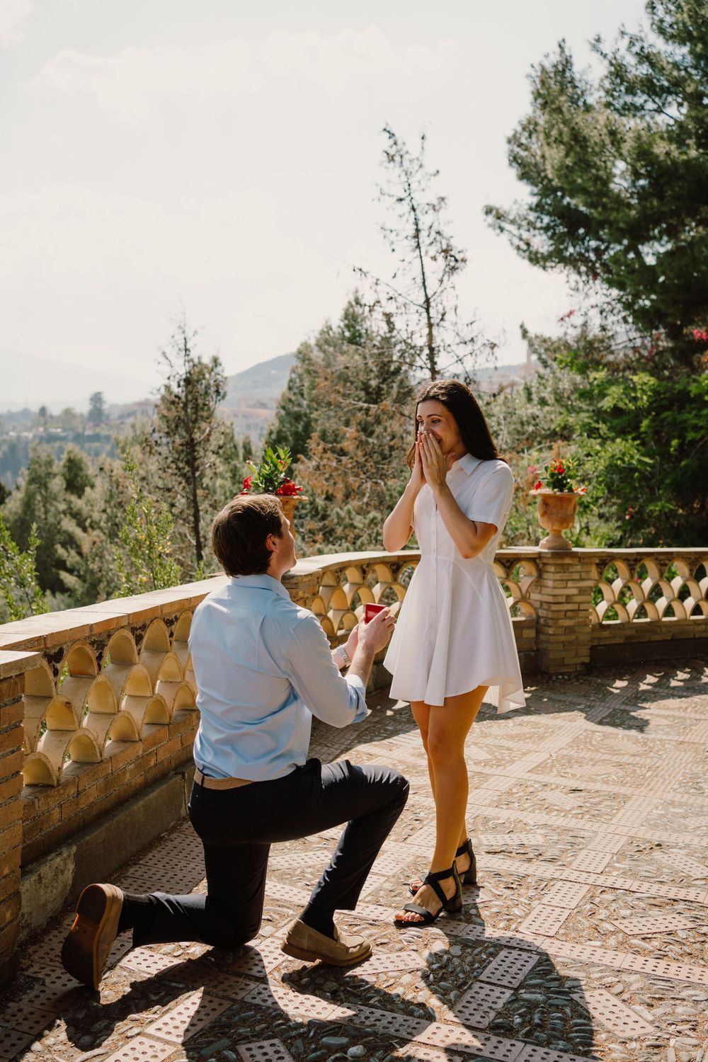 A surprise proposal in Villa Comunale of Taormina, Sicily