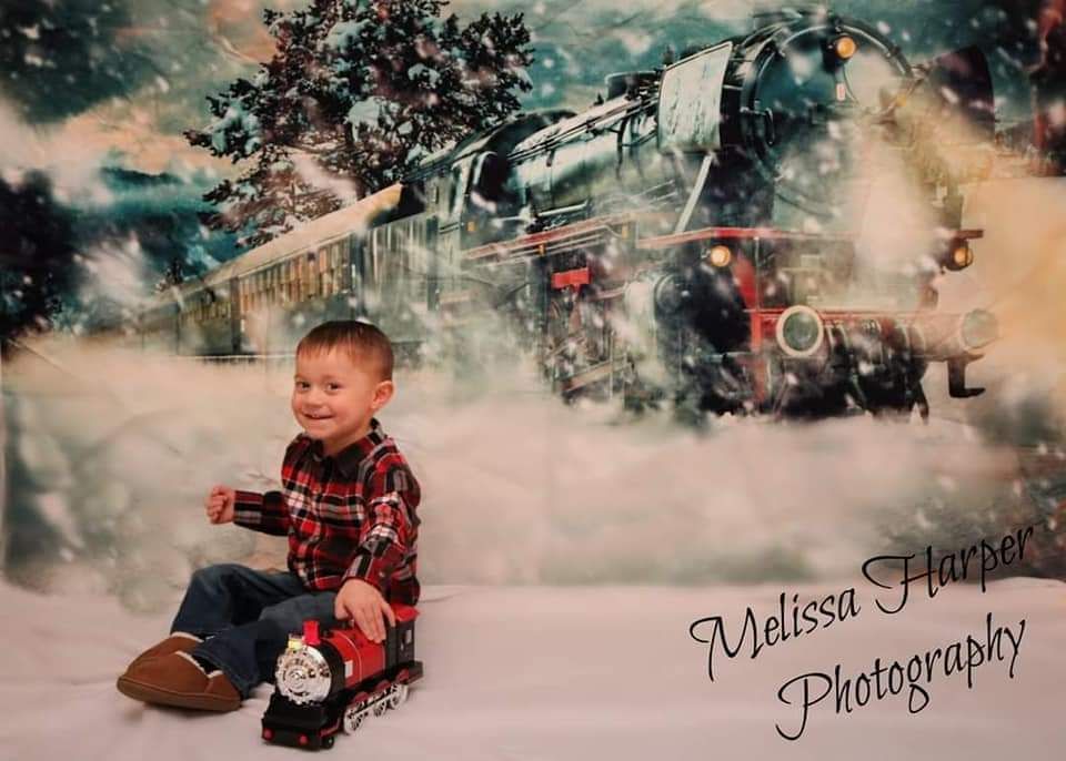 Vintage train themed holiday photo set with smoke effects and moody lighting.