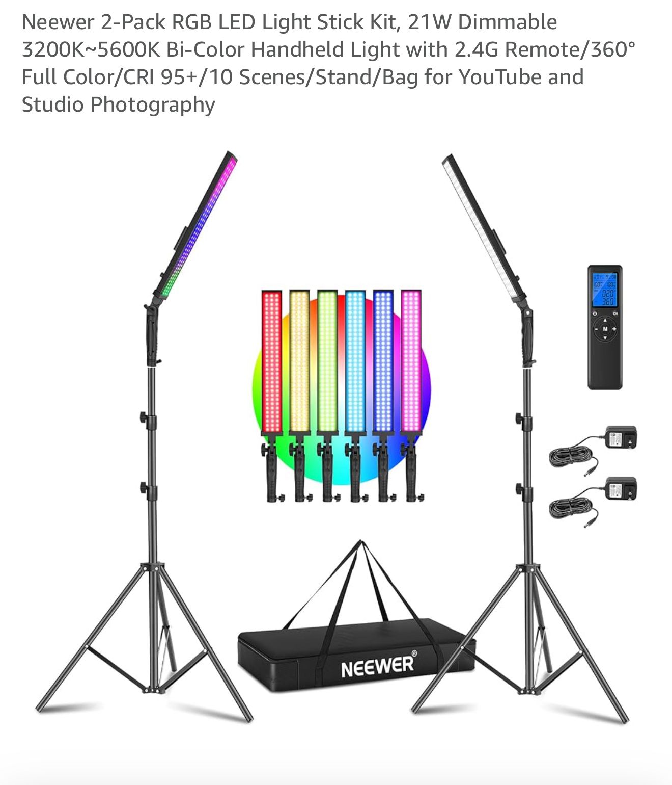 Professional photography lighting kit with softboxes, boom arm and controller for studio photography and video production.