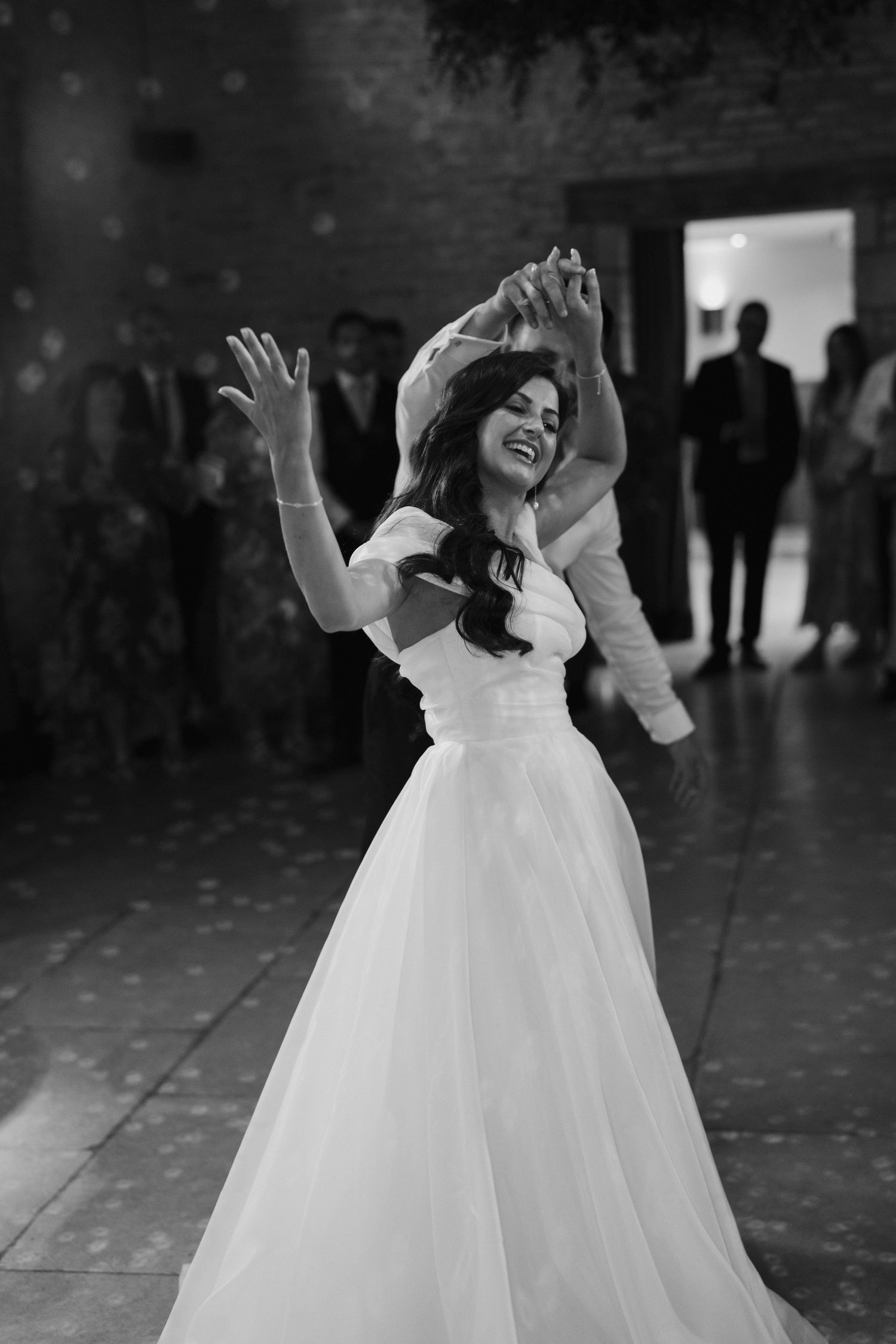 bride and groom dancing at yardspace old gore in cirencester