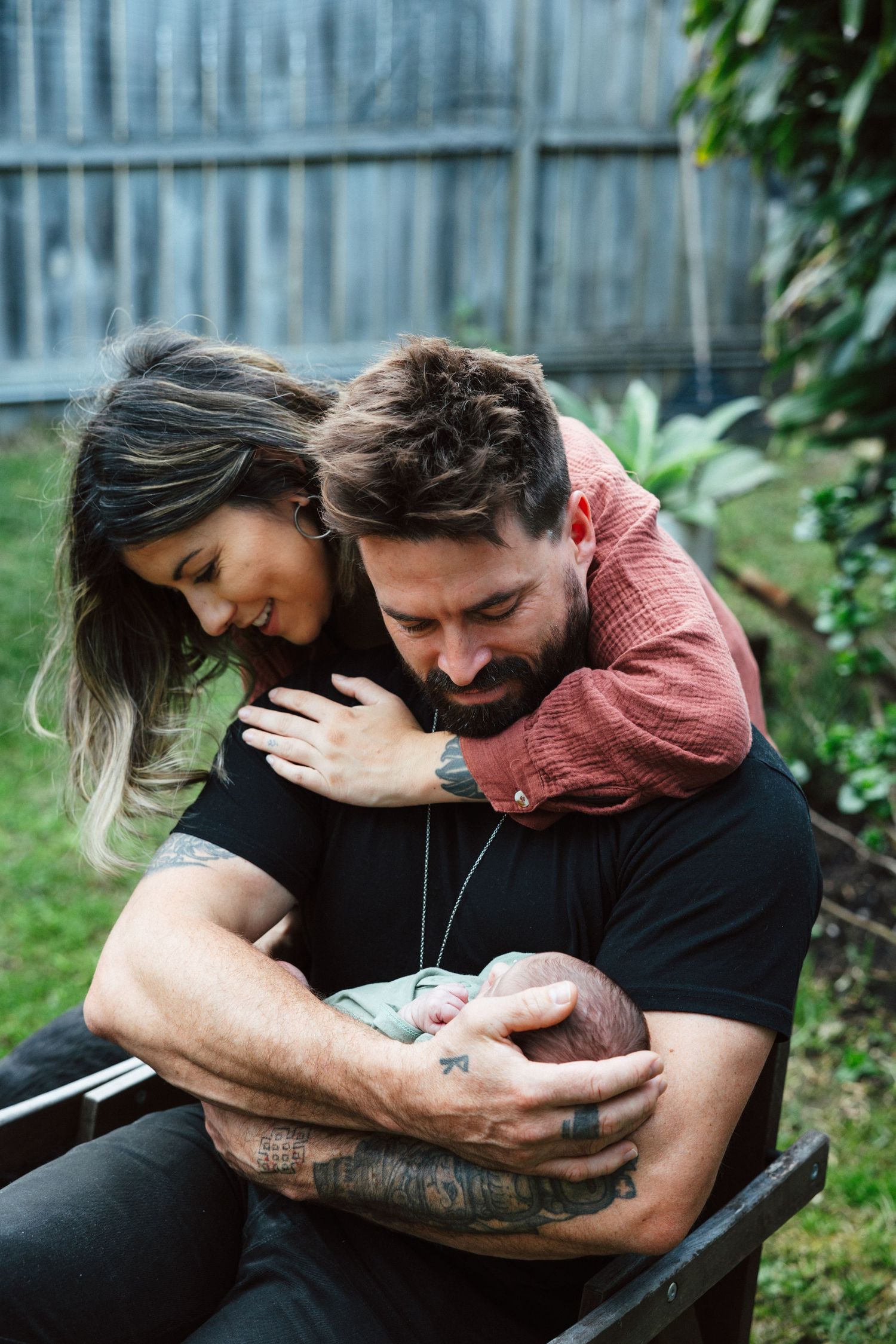 Newborn Photography - Parents with Baby in garden at Avalon Home, Northern Beaches, Sydney