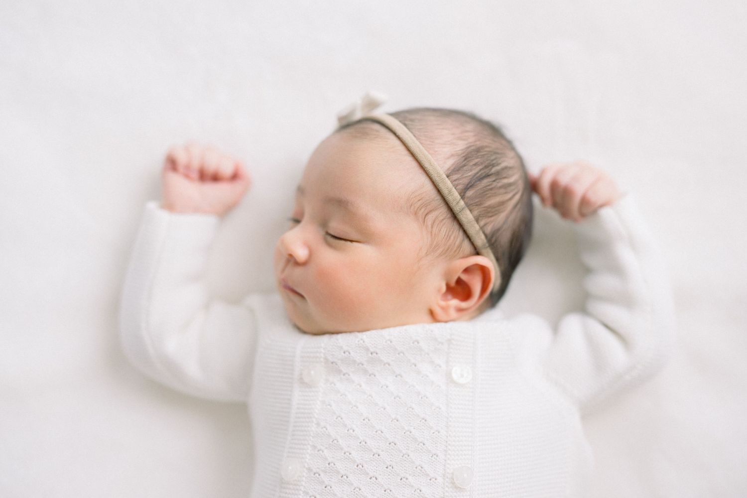 a photo of a newborn taken by a washington dc newborn photographer at a newborn session in Mclean