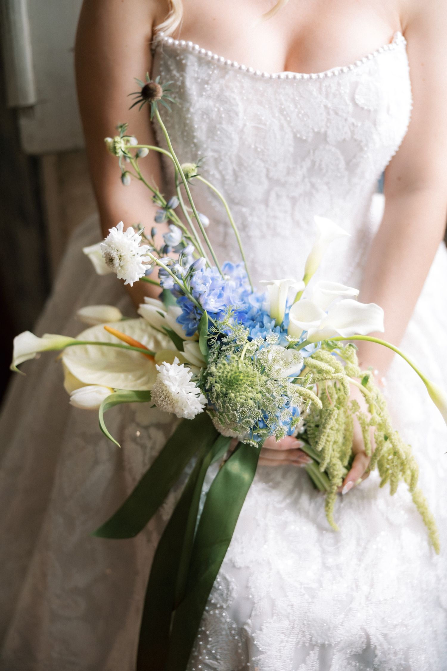 Romantic bride portrait holding bouquet in Portugal