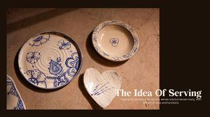 Collection of blue and white handcrafted ceramic plates and a heart-shaped dish arranged on a surface.