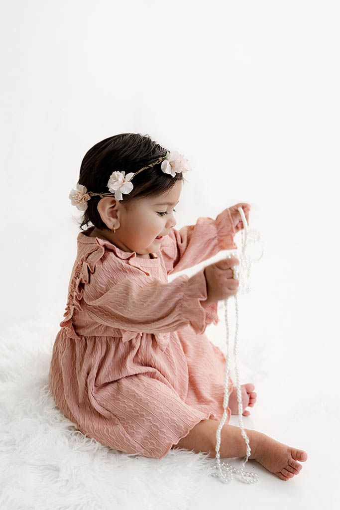Baby girl's 1st birthday photoshoot by Menifee first birthday photographer.