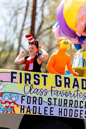 First grade class favorites parade float featuring Dr. Seuss characters Cat in the Hat and the Lorax.