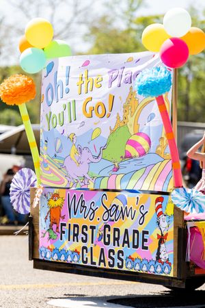 Colorful Dr. Seuss themed parade float for Mrs. Sam's First Grade Class featuring Oh The Places You'll Go decorations.