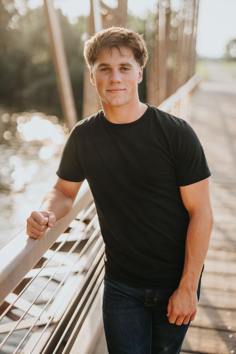 Casual portrait sequence featuring someone in a black t-shirt and jeans in an outdoor setting.