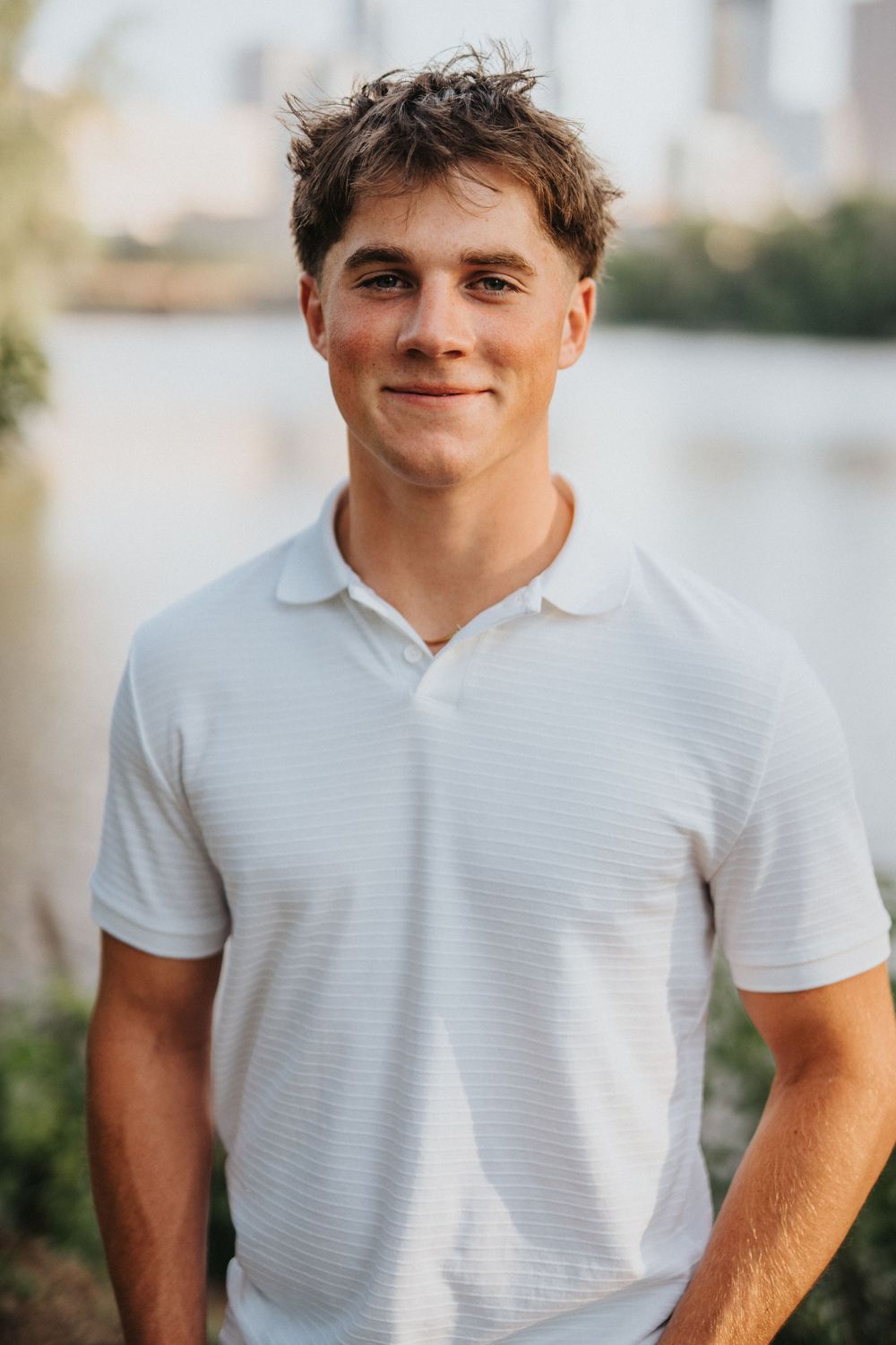 A series of close-up portrait shots showing someone wearing a white polo shirt against a blurred background.