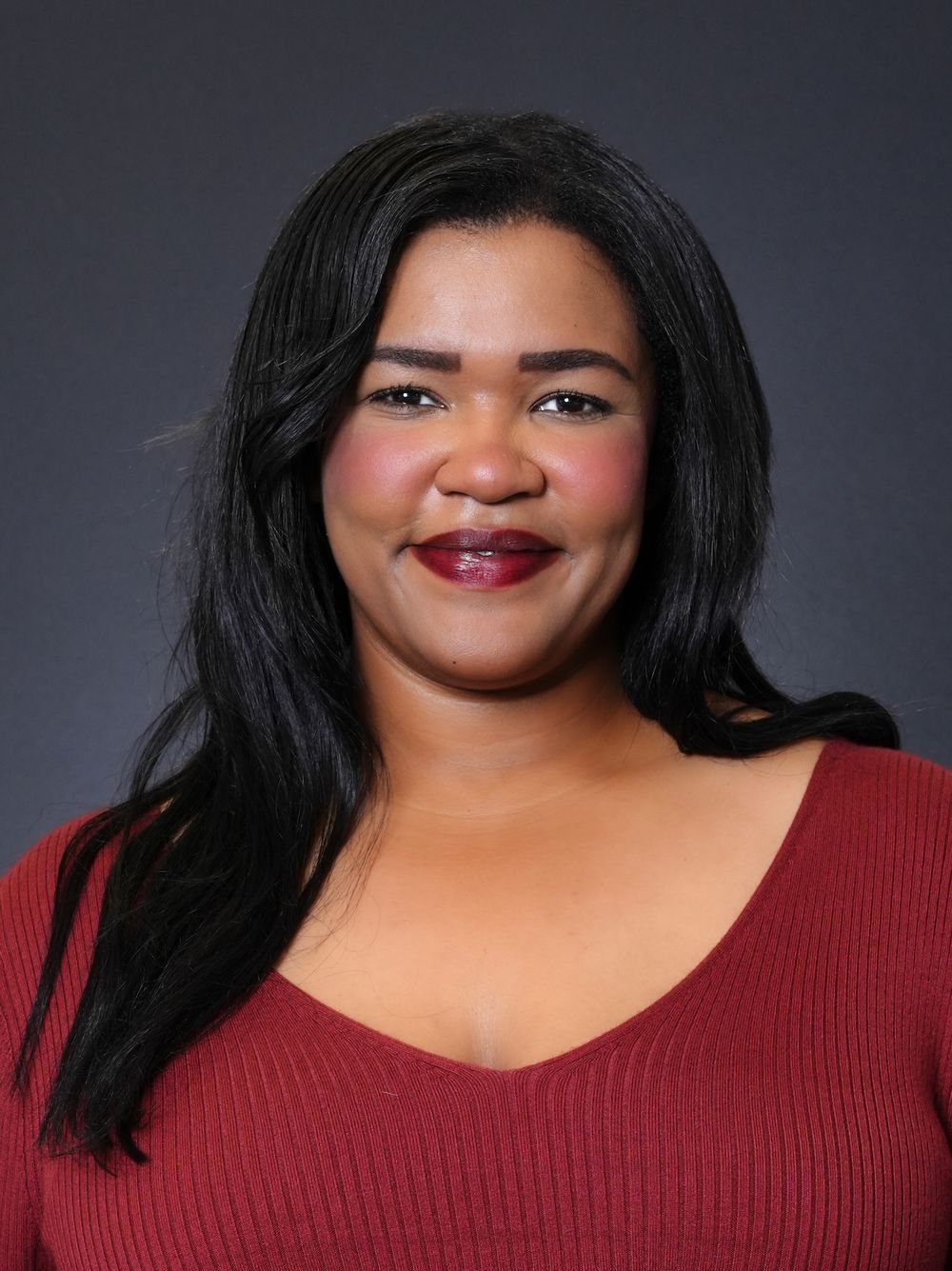 Professional headshot of a smiling woman.  kw Tampa realty headshots. Tampa Bay photographer BE Jazy Photography