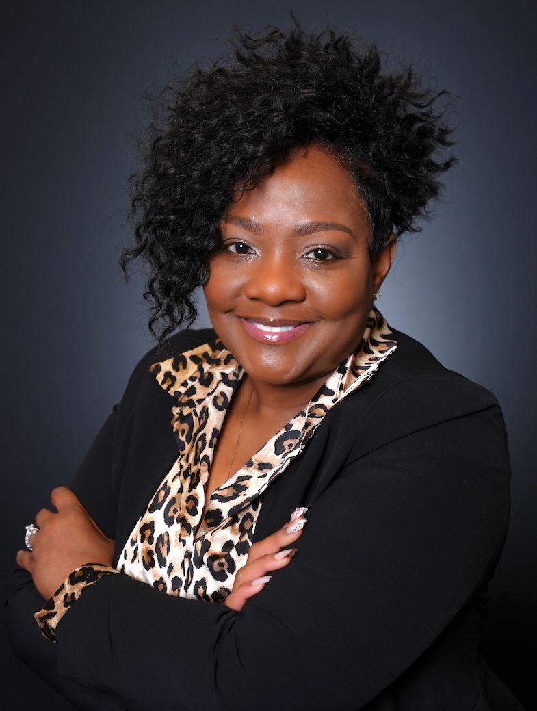Professional headshot series showing expressions of warmth and personality against a dark studio background.
