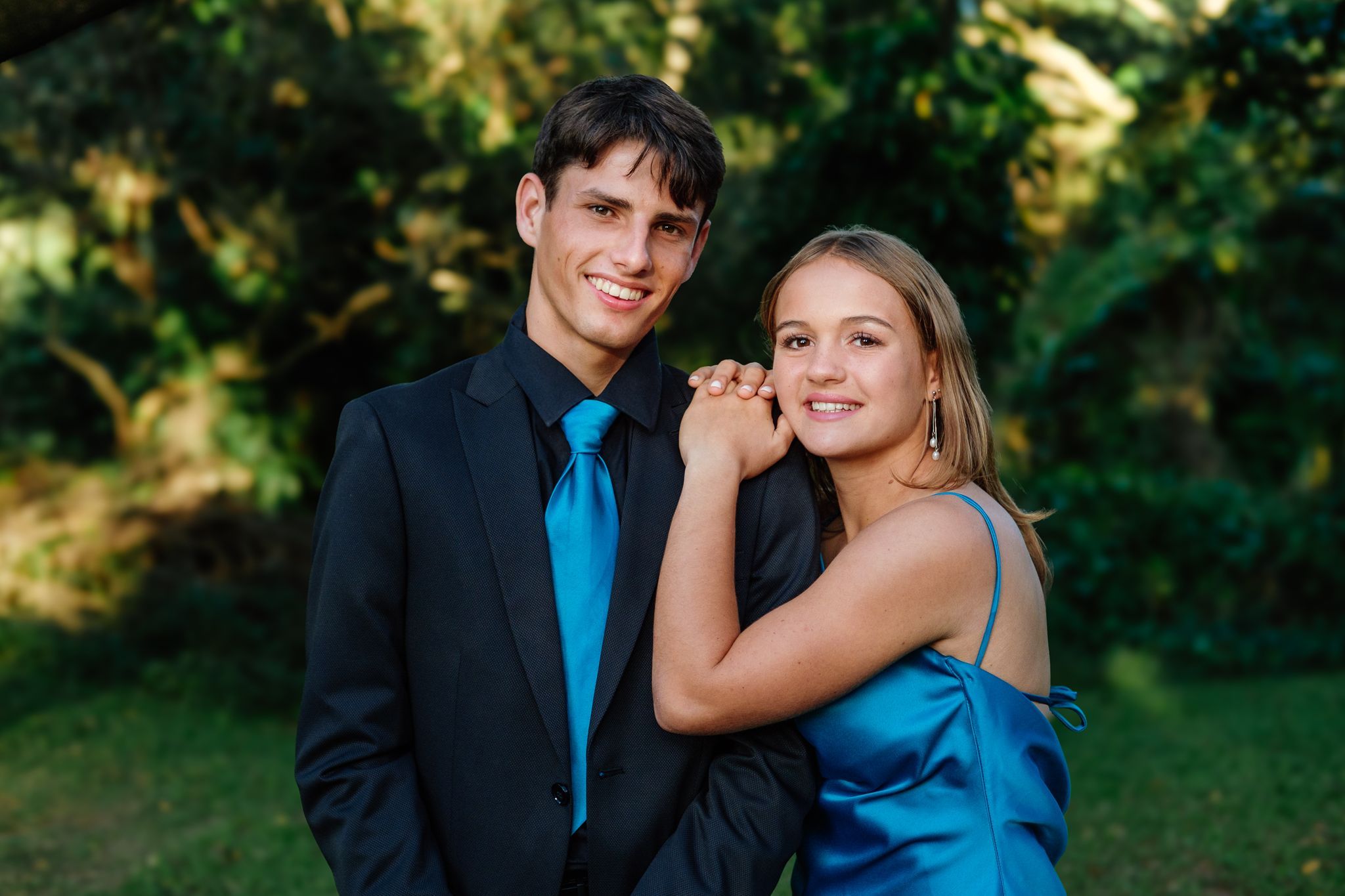 Matric farewell couple with the matriculant wearing a flowing blue dress
