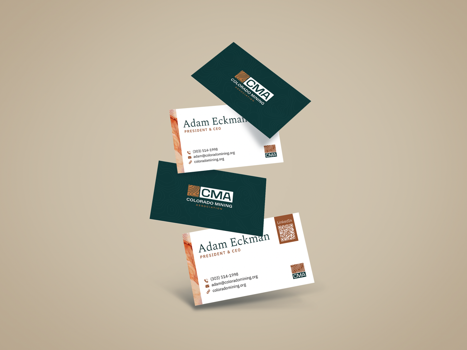 Business cards mockup displaying green and orange brand identity designs.