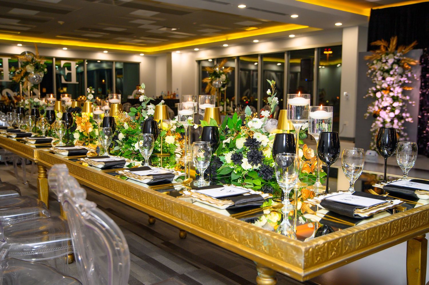 Modern bar interior with illuminated countertop and ambient lighting.