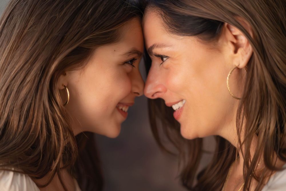 Two people share an intimate moment in a series of close-up profile shots showing tender expressions and emotions.
