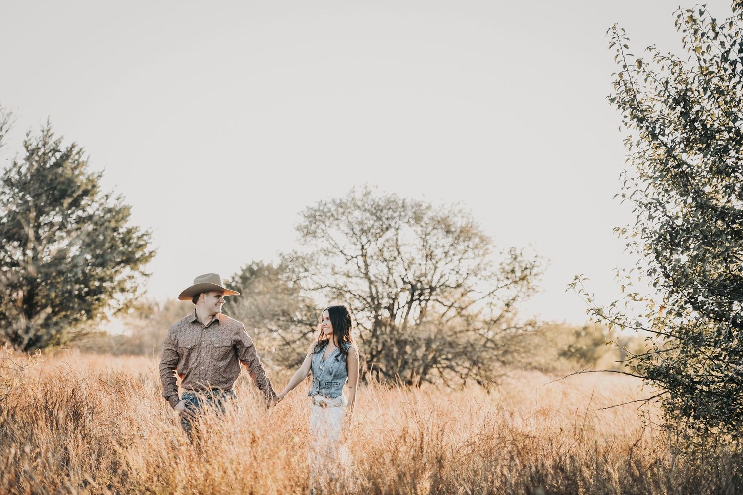 DFW engagement photographer capturing rustic sunset engagement photos