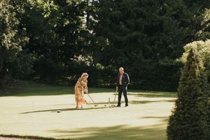 Wedding guests play outdoor games on the lawn of Washingborough Hall - taken by Grimsby photographer.
