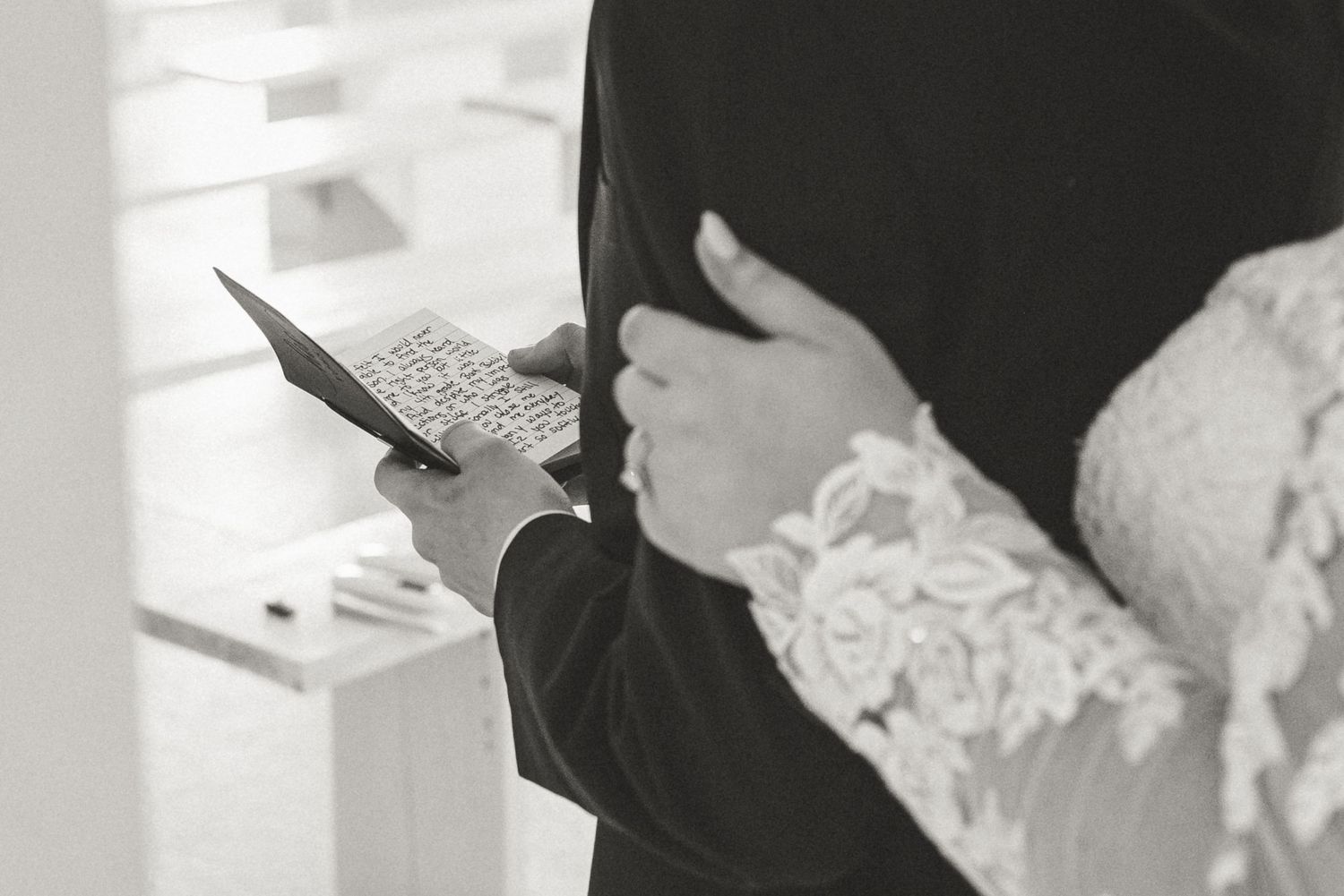 Black and white close-up shots capturing tender wedding day moments.
