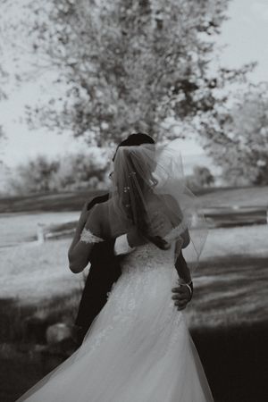 Black and white wedding photography sequence showing an intimate moment through a veil.