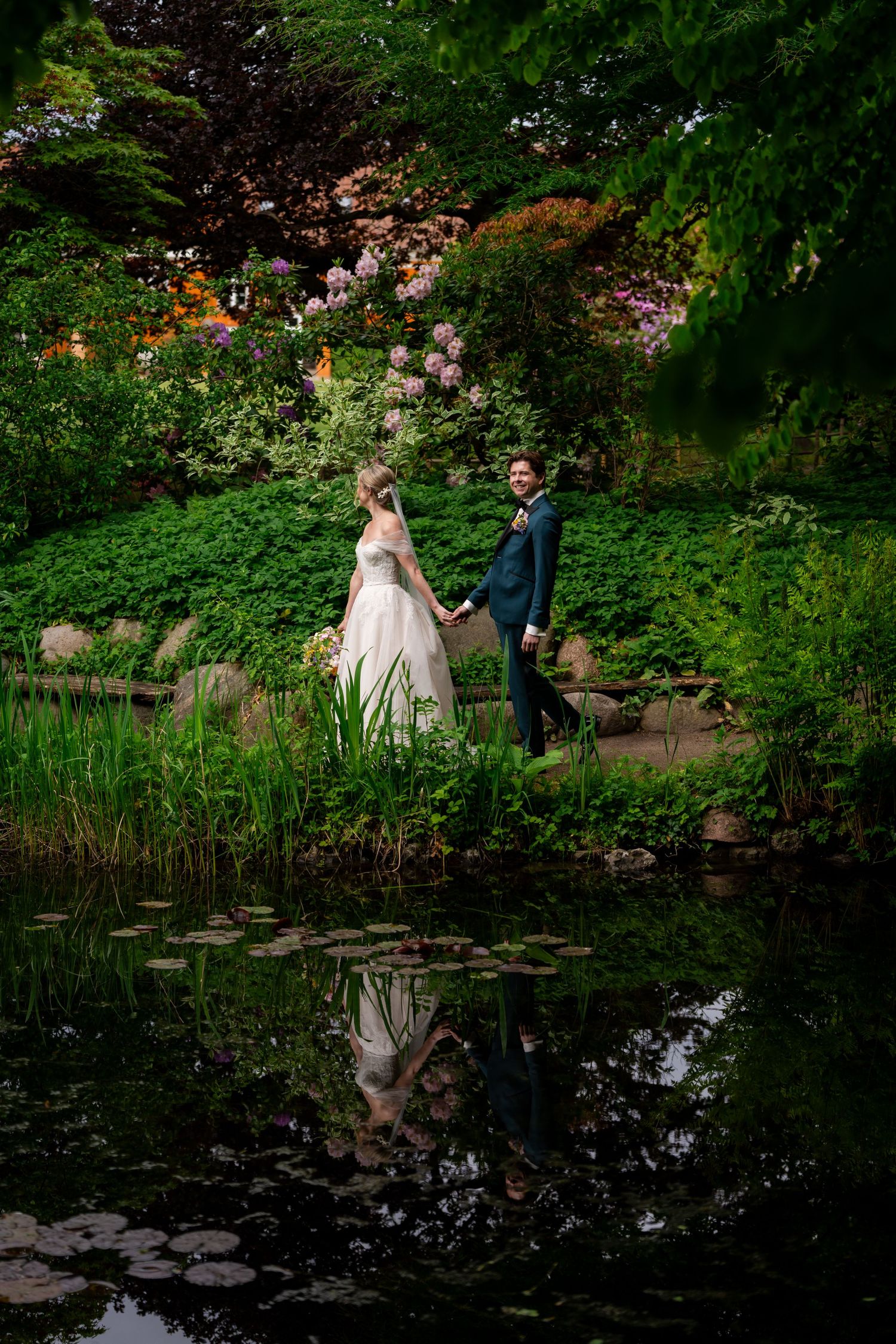 Garden wedding photo with reflection.