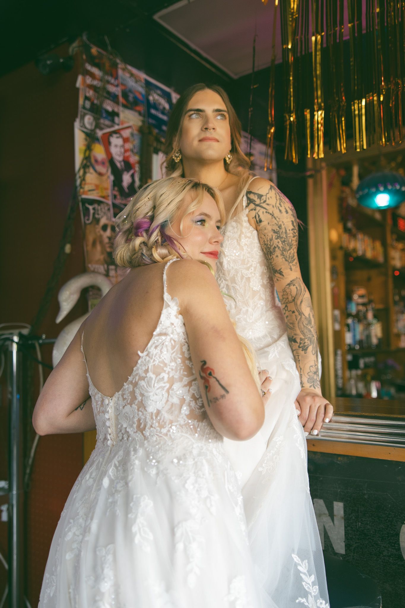 lesbian queer wedding elopement lgbtq kissing bar asheville nc bride dresses