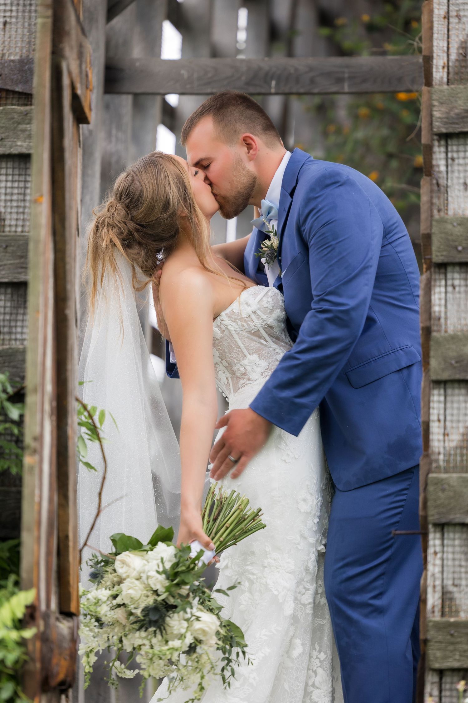 wedding day kiss at gillbrook farms