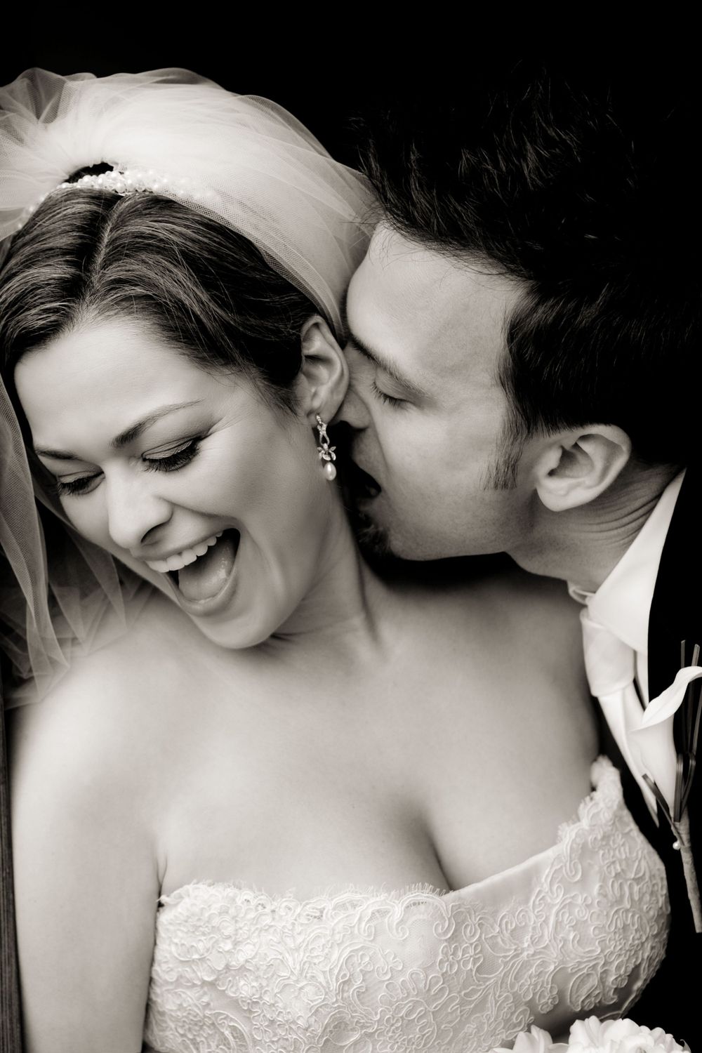 A joyful black and white wedding moment captured with natural emotion.