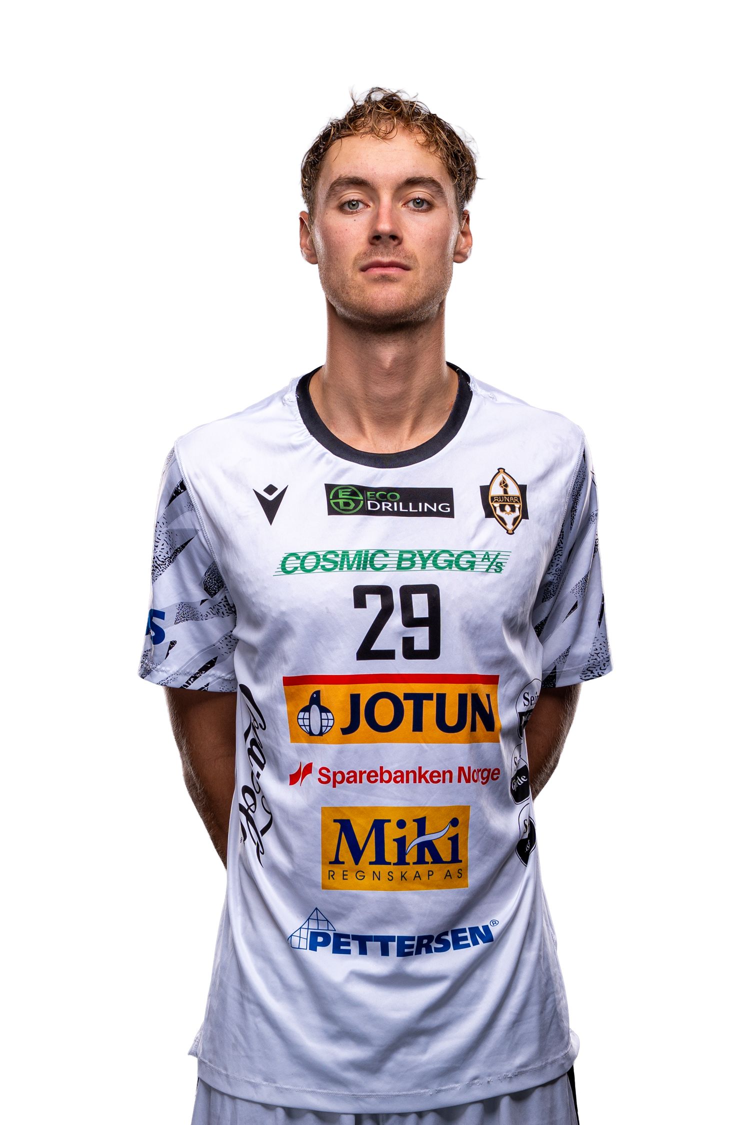 White sports jerseys with sponsor logos including Jotun and MTI displayed on the front.