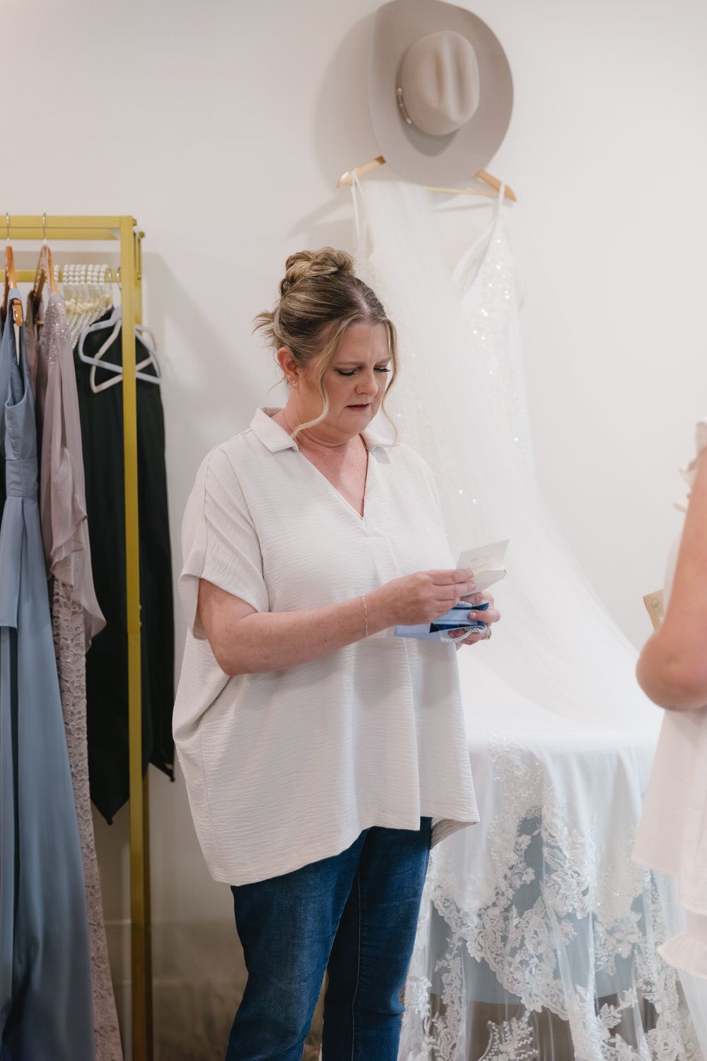Brides mom opening gift from bride on North Georgia intimate wedding day