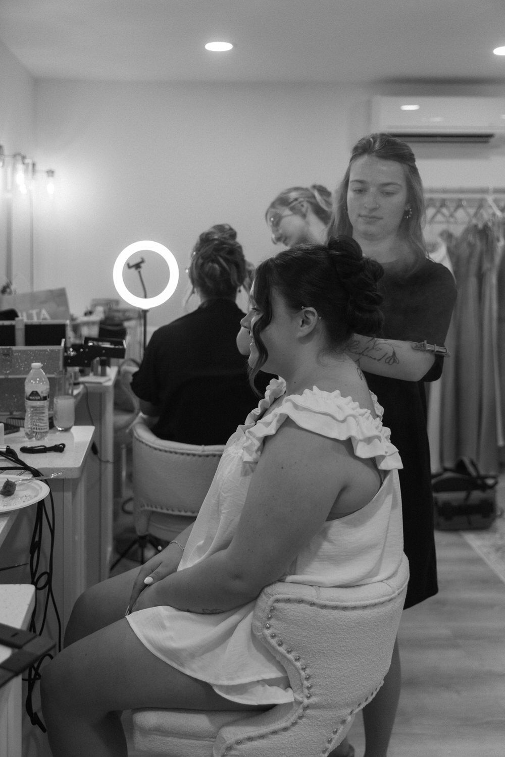 Bride getting her hair done on her wedding day by Elleigh Blair Beauty