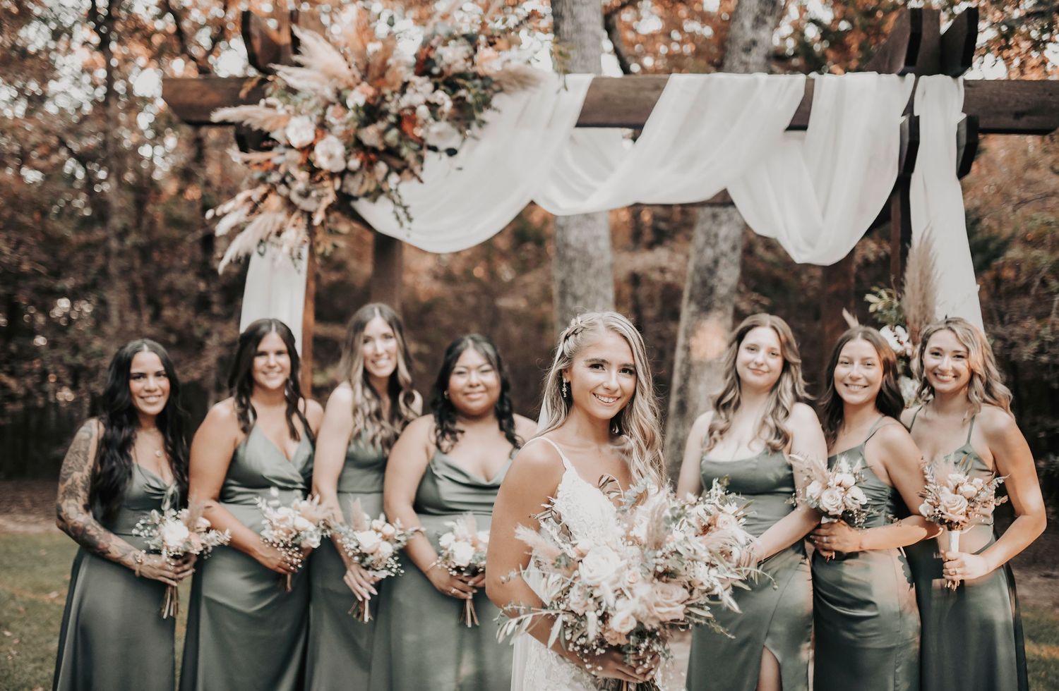 Fall wedding bridal party portraits with boho floral bouquets and earthy wedding colors