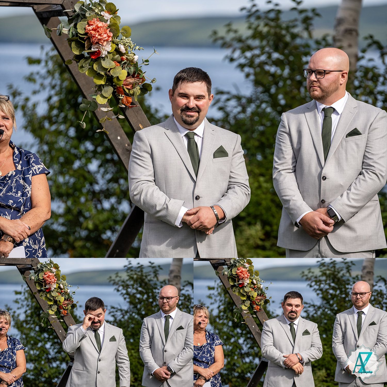 Groomsmen in light gray suits and green boutonnieres stand together during an outdoor wedding ceremony by the water.
