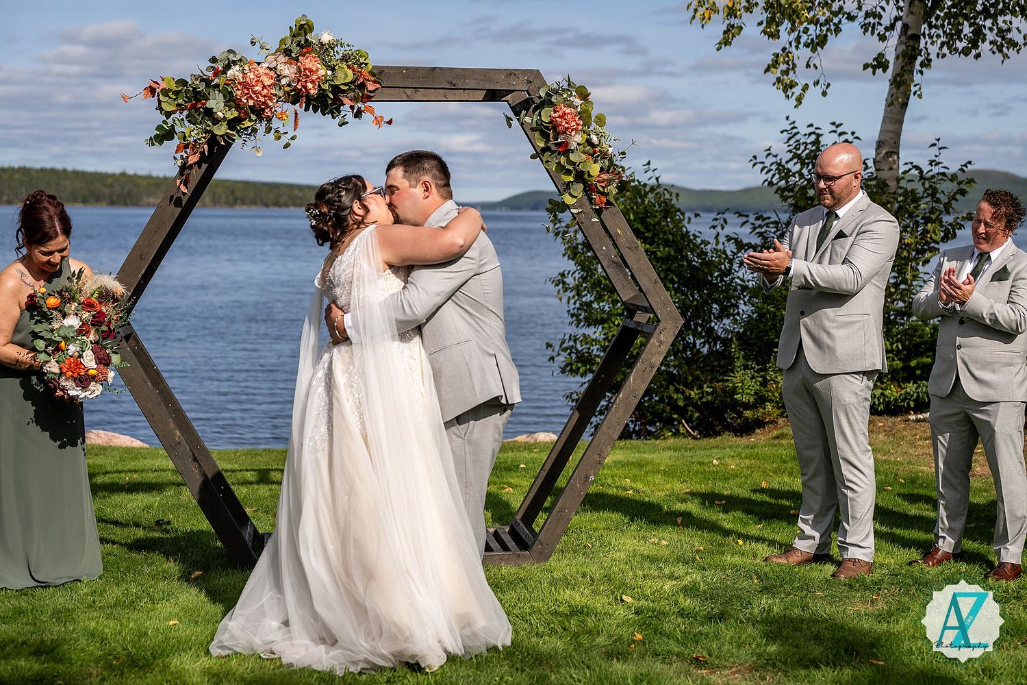 A romantic lakeside wedding celebration showing multiple frames of couples dancing under floral arches on a grassy lawn.