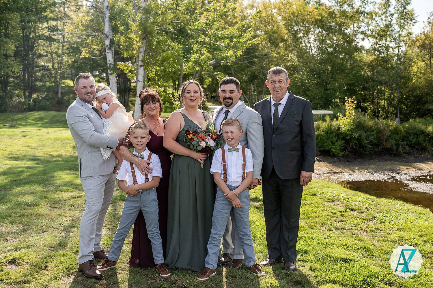 Family group photos at an outdoor wedding with children and adults in formal attire.