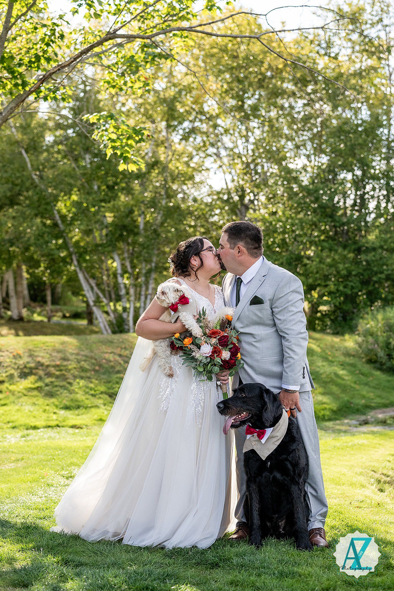 A romantic wedding photo series featuring a couple and their black dog in a sunlit outdoor garden setting.