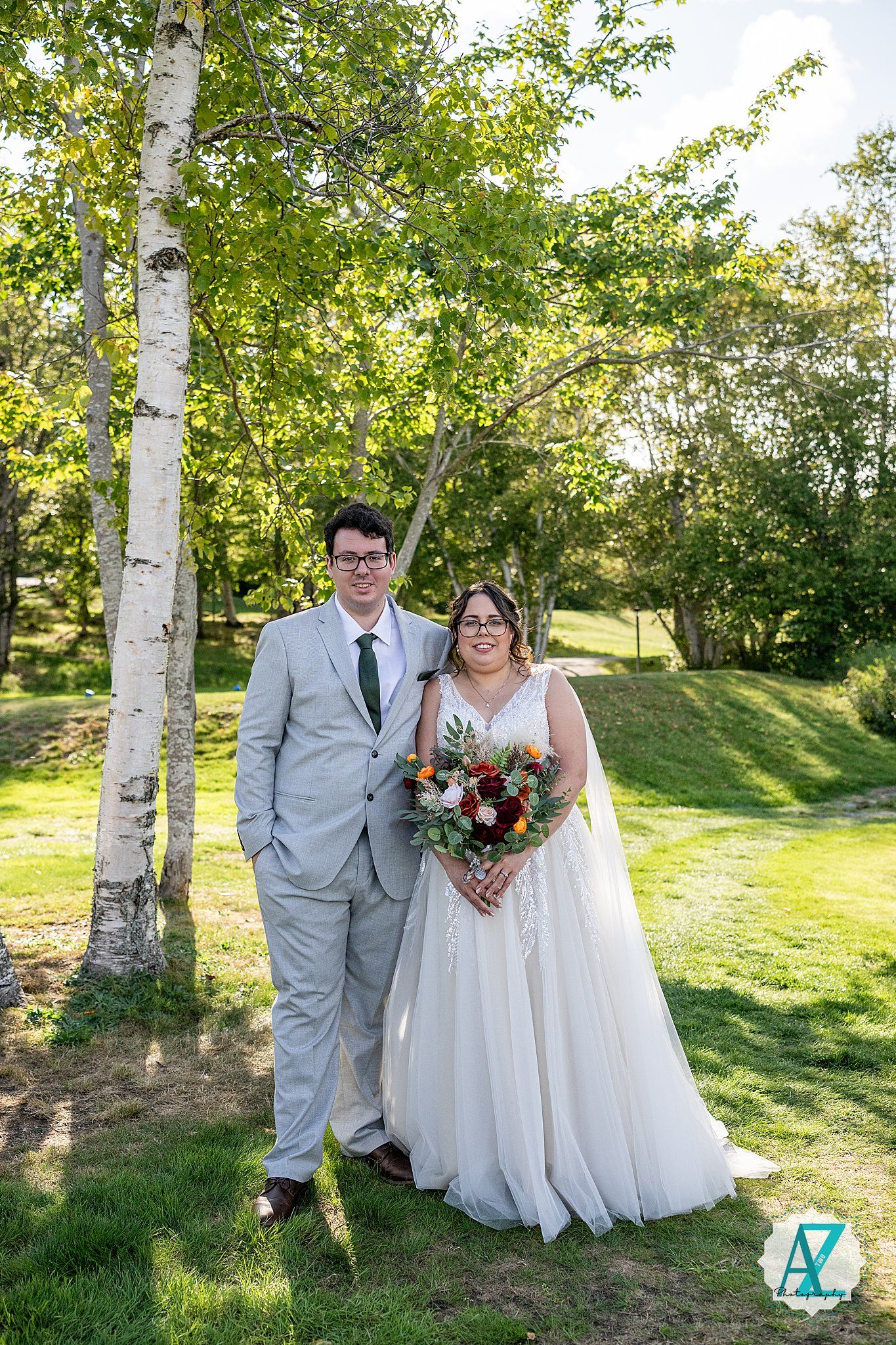 A wedding photo series showing a couple posing together among birch trees in a sunlit garden setting.