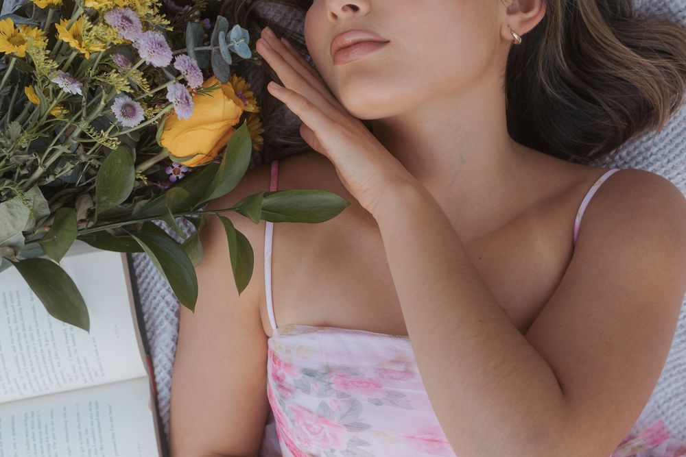 Artistic beauty portrait series showing close-up poses with yellow flowers and delicate pink details.