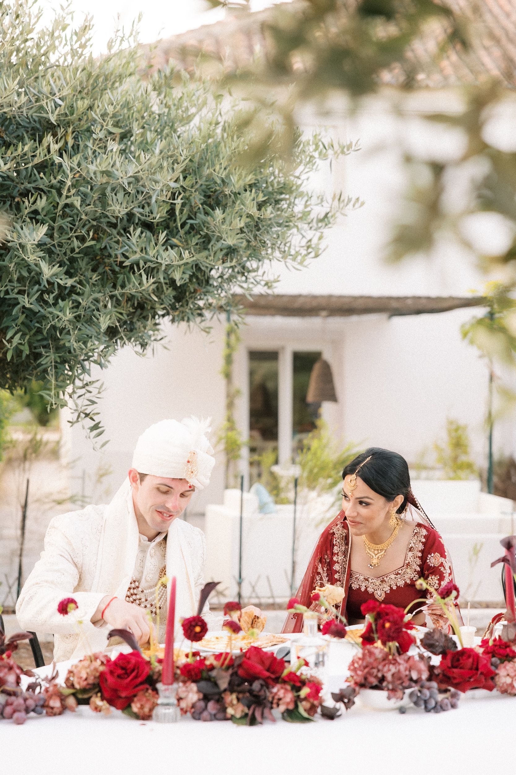 indian bride and groom dining at Indian wedding reception in Portugal