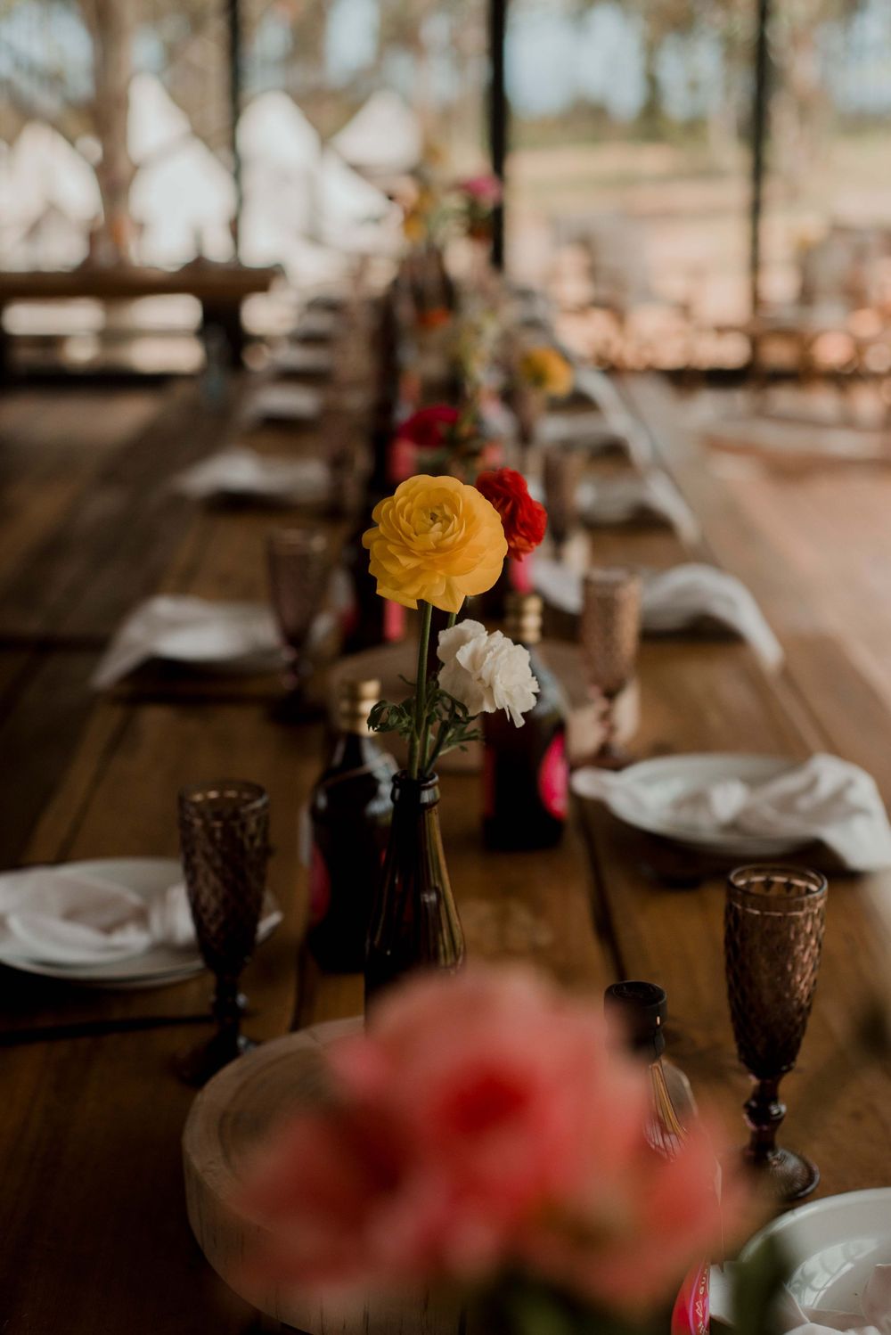 A vibrant pink festival setup with thoughtful homemade drinks for every guest, bringing color and joy to the celebration.
