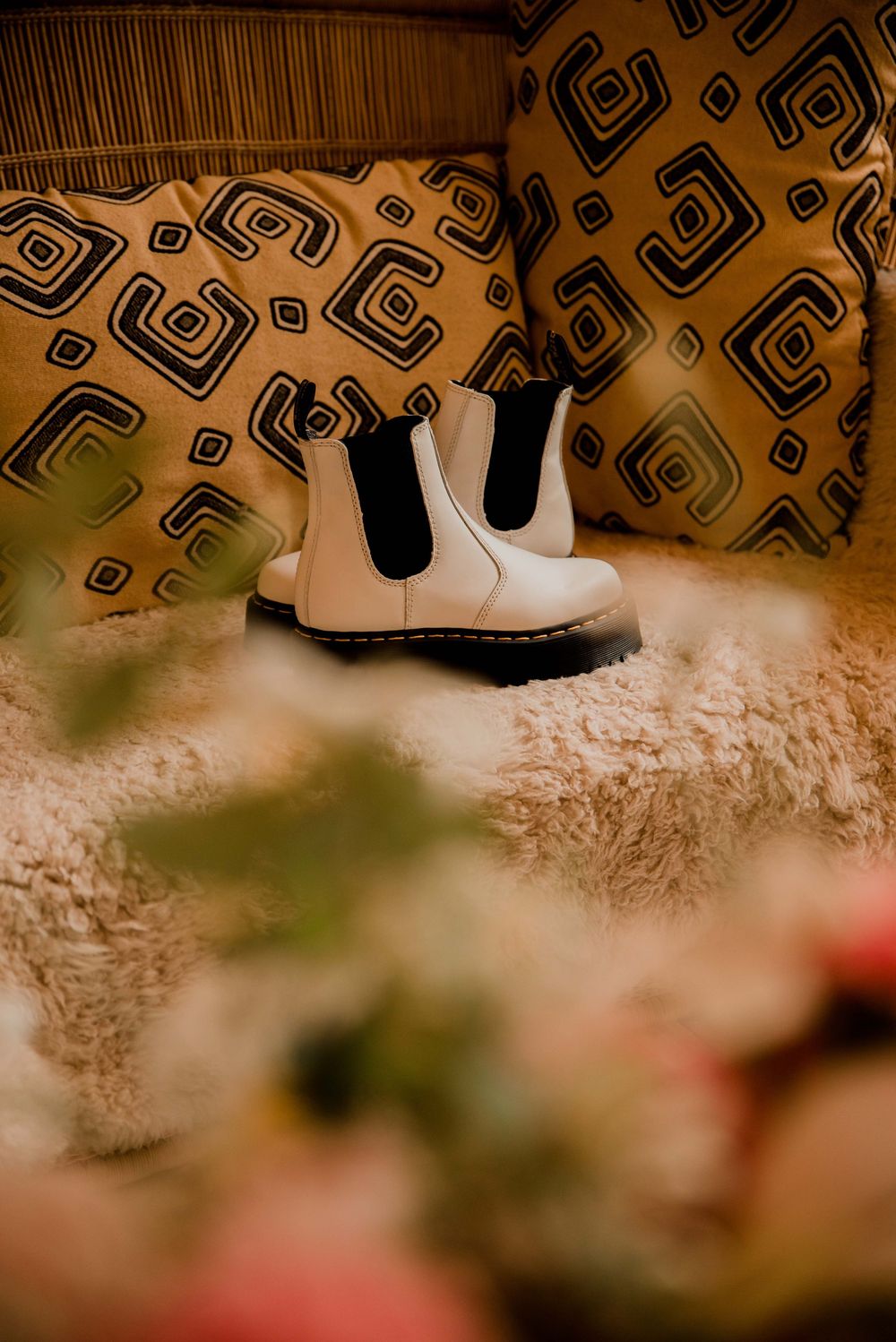 creative detail photograph of the brides wedding boots