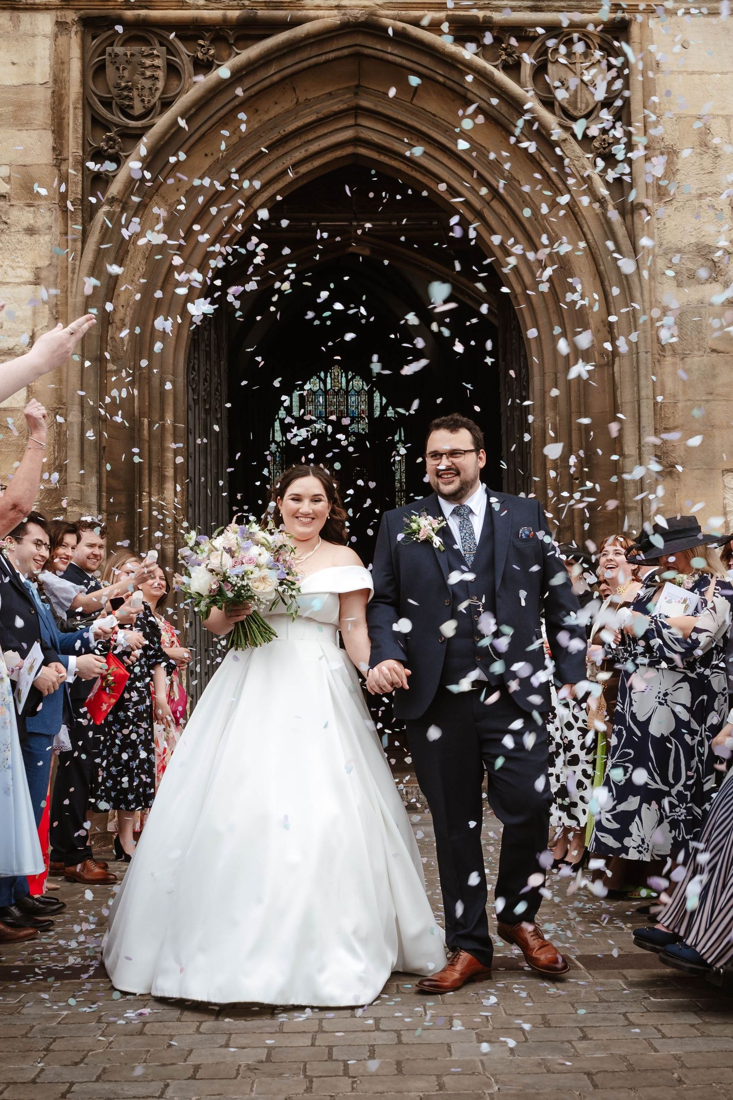 Gloucester Cathedral wedding photographer Gloucestershire Cheltenham Confetti outside the east door
