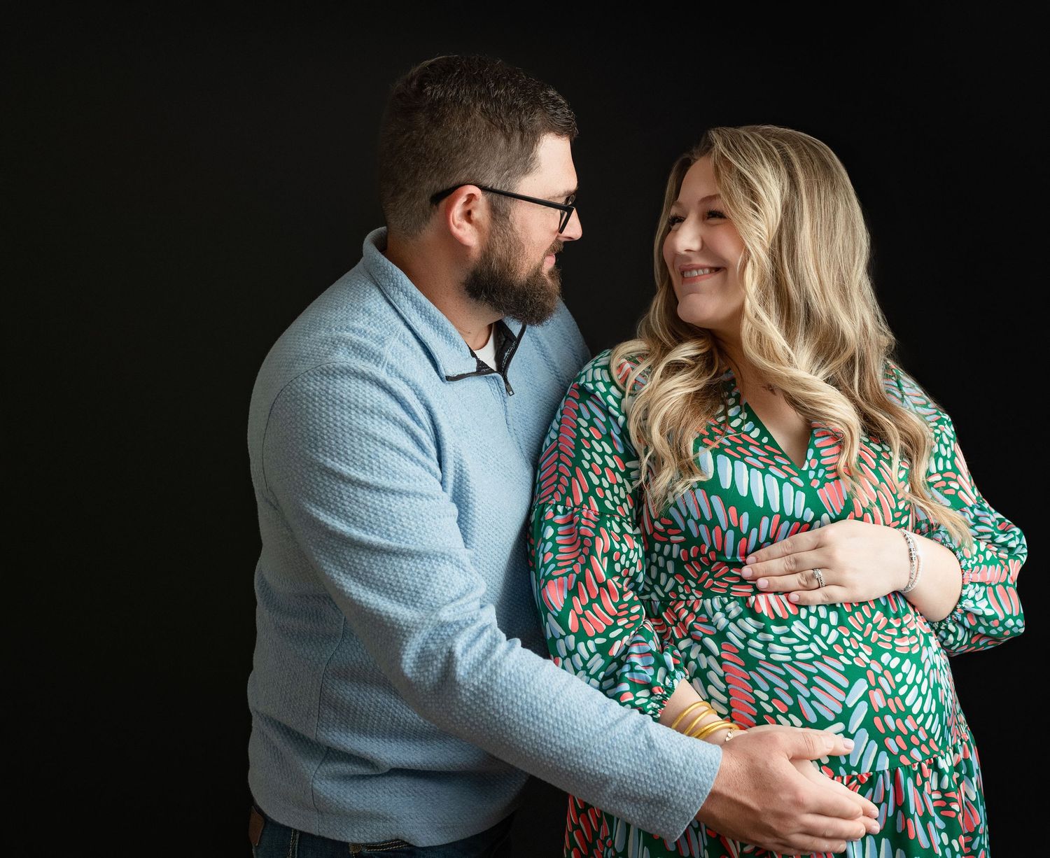 Mom and dad holding belly. Greenville sc newborn photographer, Easley sc newborn photographer, Greenville sc newborn photos