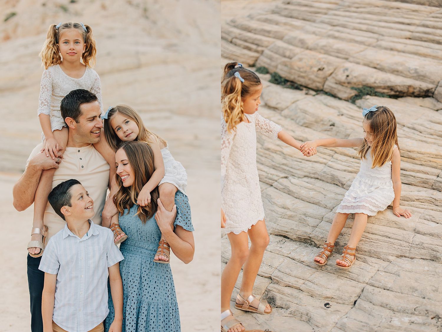 A happy family of five poses together on sandy rocks, while two girls in white dresses play nearby on layered stone.