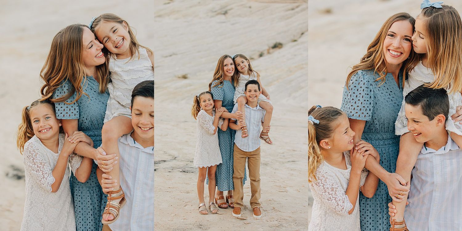 Joyful family portrait of a mother and four children hugging and laughing outdoors.