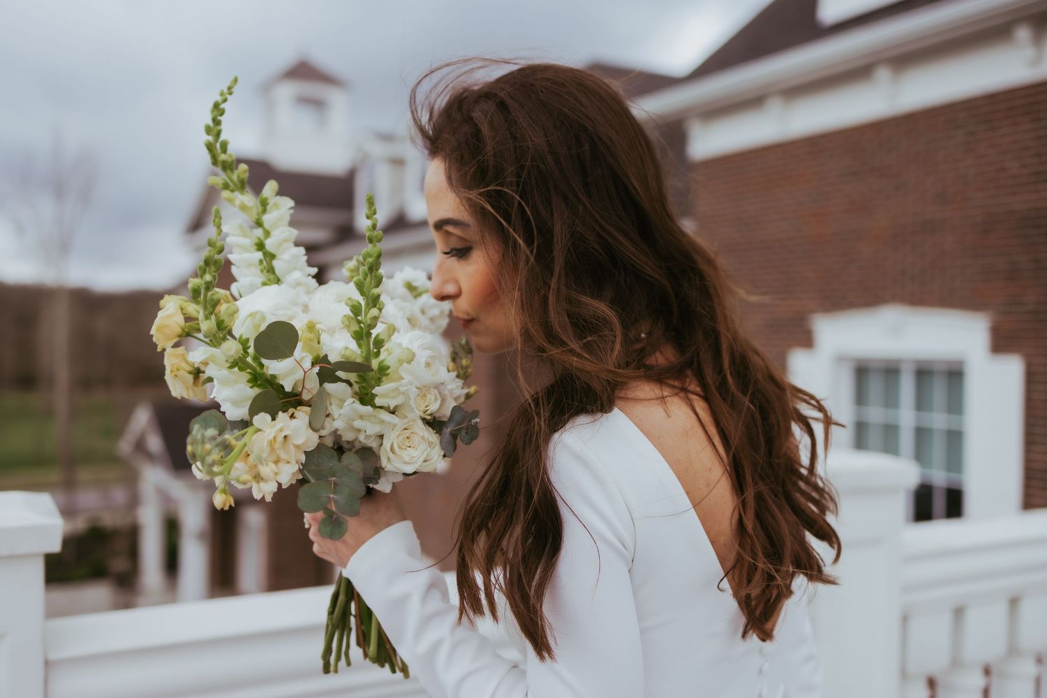 Bridal portrait on a windy day after getting married at Holliday Farms in Zionsville, Indiana