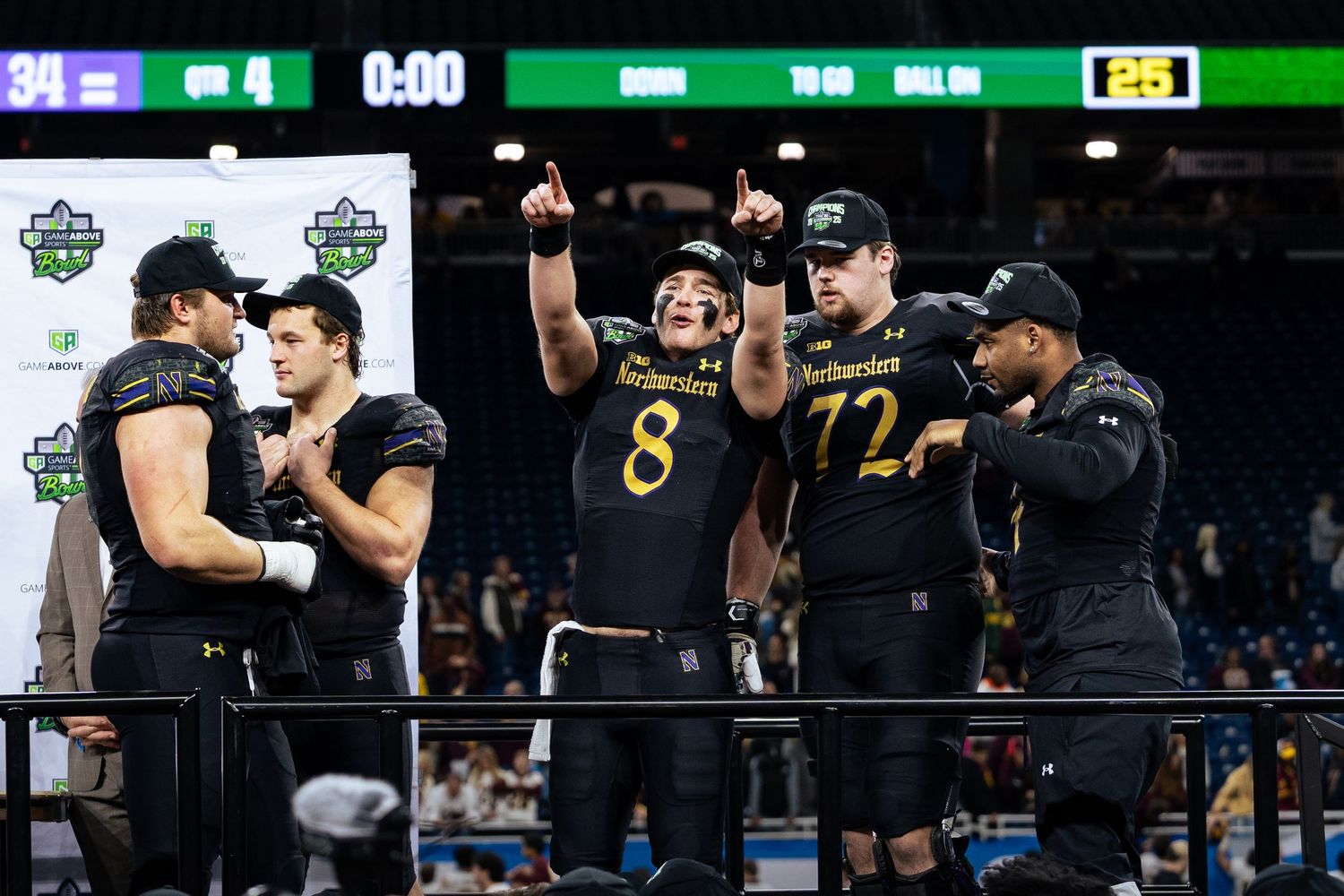 Northwestern University celebrating GameAbove Sports Bowl win, Northwestern vs Central Michigan, Ford Field, Detroit MI, 12/26/25