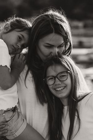 Series of black and white photographs showing laughter and connection between two people.