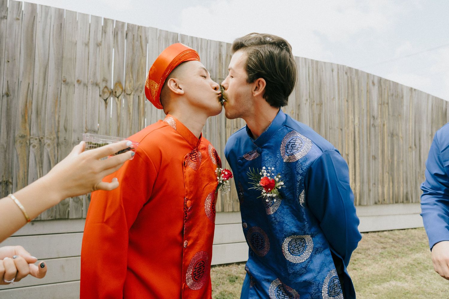 groom plays game in tea ceremony wedding