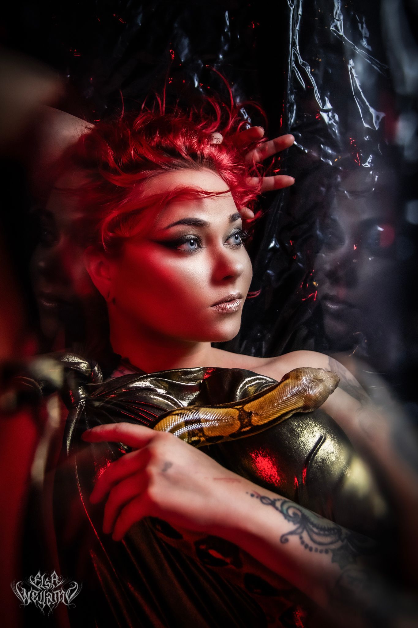 Dark fantasy portrait showing dramatic red lighting and gold armor details in a moody, ethereal setting with smoke effects.